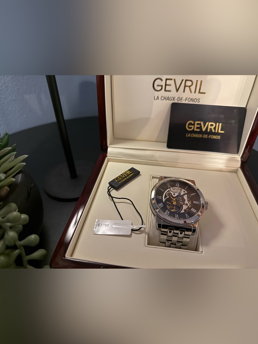 GEVRIL Men’s Silver Bracelet Skeleton Dial Watch with Black Face